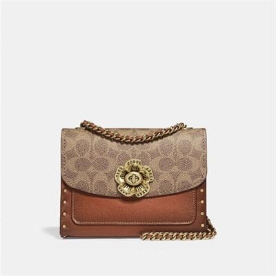 Fashion 4 Coach Parker 18 In Signature Canvas With Rivets