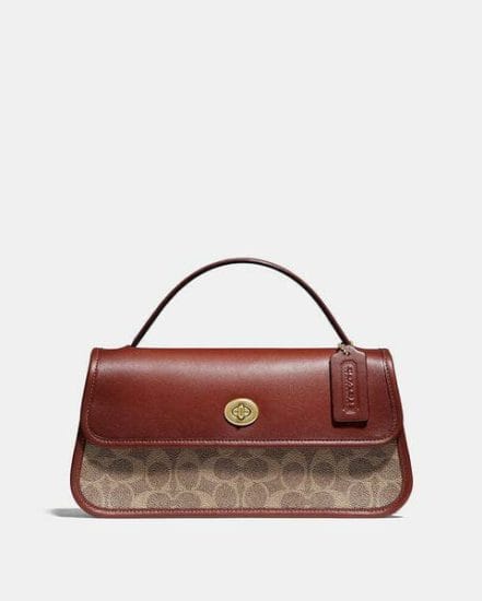 Fashion 4 Coach Turnlock Clutch In Signature Canvas