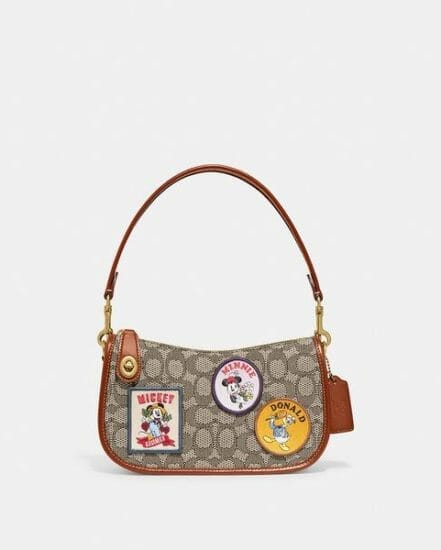 Fashion 4 Coach Disney X Coach Swinger 20 In Signature Textile Jacquard With Patches